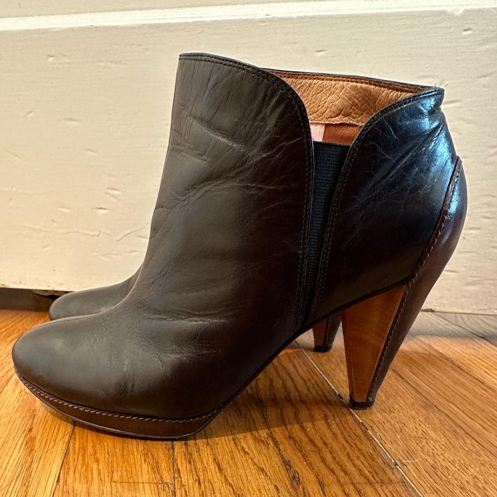 Fossil two-toned, black and brown high heeled leather booties - size 8.5